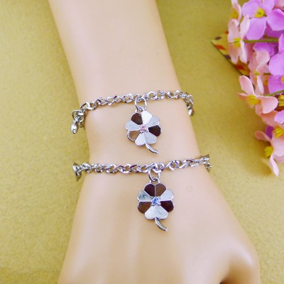 http://www.orientmoon.com/106685-thickbox/jewelry-lovers-bracelets-created-infinity-charm-chain-four-leaf-clover-couple-bangles-2pcs-set.jpg
