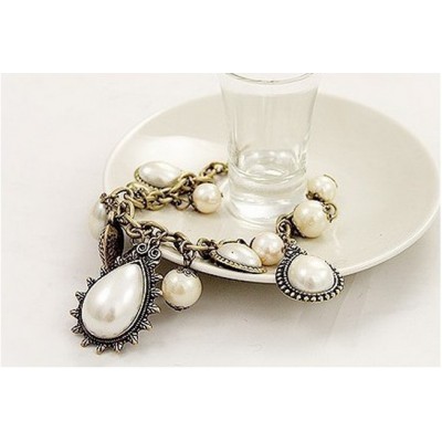 http://www.orientmoon.com/16049-thickbox/vintage-peach-heart-water-drop-pearl-bracelet-ta140.jpg