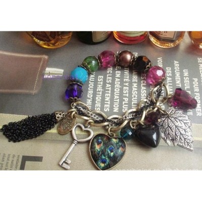 http://www.orientmoon.com/16087-thickbox/faddish-alloy-bracelet-with-tassels-peacock-peach-heart-leaf-pendants.jpg