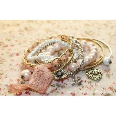 http://www.orientmoon.com/16129-thickbox/stylish-multilayed-imitation-pearl-alloy-bracelet-tb16.jpg