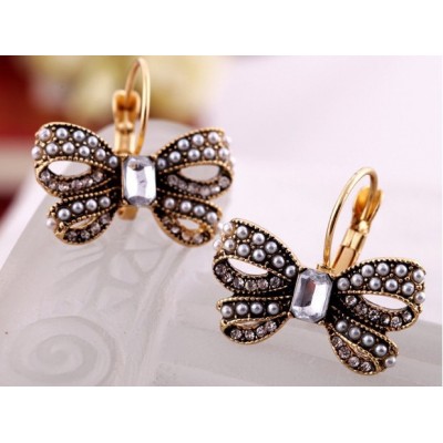 http://www.orientmoon.com/17920-thickbox/vintage-pearl-diamonds-butterfly-earring.jpg