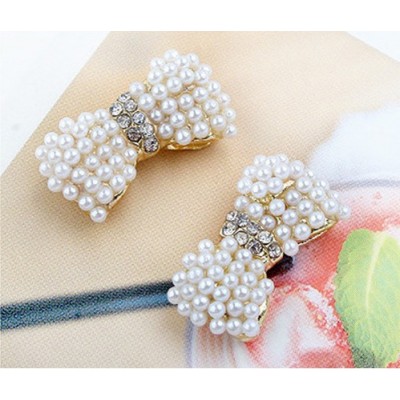 http://www.orientmoon.com/17939-thickbox/hot-sale-shiny-diamonds-bowknot-alloy-earring.jpg