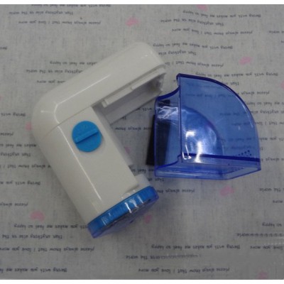 http://www.orientmoon.com/19540-thickbox/portable-hair-bulb-lint-remover-trimmer-shaver-with-mini-brush-for-travel.jpg