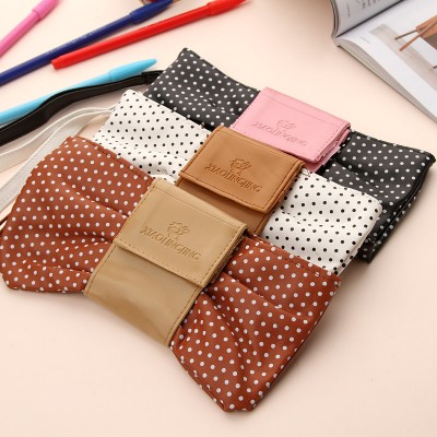 http://www.orientmoon.com/59080-thickbox/pencil-bag-stationery-bag-lovely-bow-tie-design-pu-w2142.jpg