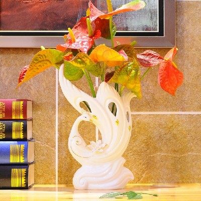 http://www.orientmoon.com/64830-thickbox/creative-ceramic-peacock-shaped-craft-for-home-decoration.jpg