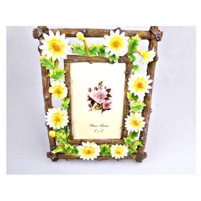 http://www.orientmoon.com/65179-thickbox/sun-flower-resin-photo-frame.jpg