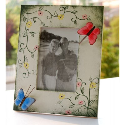 http://www.orientmoon.com/65192-thickbox/classic-butters-and-flowers-metal-photo-frame.jpg