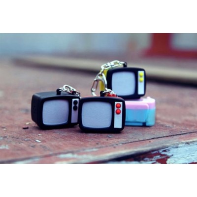 http://www.orientmoon.com/65380-thickbox/vintage-tv-shaped-phone-chains-cellphone-pendants.jpg