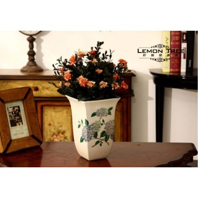 http://www.orientmoon.com/66834-thickbox/european-style-creative-ceramic-flower-vase-pattern-family-artware.jpg