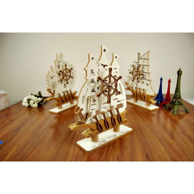 http://www.orientmoon.com/75590-thickbox/decorative-mediterranean-style-wooden-sailing-model-with-music-box-for-desk.jpg