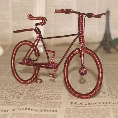 http://www.orientmoon.com/80418-thickbox/creative-handwork-metal-decorative-men-s-pattern-bicycles-with-back-seat-brass-crafts.jpg