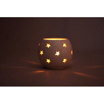 http://www.orientmoon.com/88751-thickbox/european-creative-ceramic-hallowed-out-candle-holder-candlestick.jpg